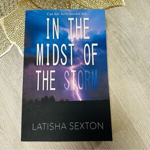 In The Midst Of The Storm by Latisha Sexton paperback book in good read once